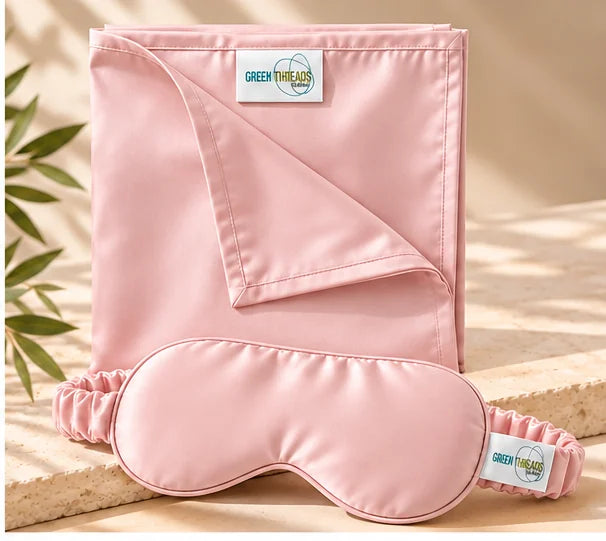 The Sleep Duo in blush pink: folded bamboo lyocell pillowcase with matching sleep eye mask.