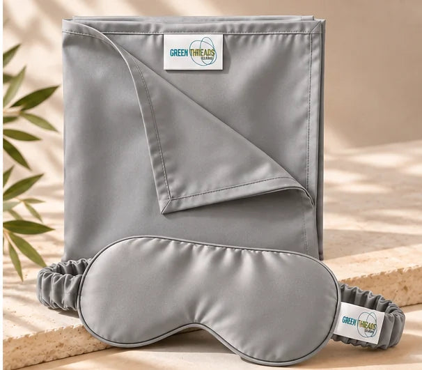 The Sleep Duo in grey: folded bamboo lyocell pillowcase with matching sleep eye mask.