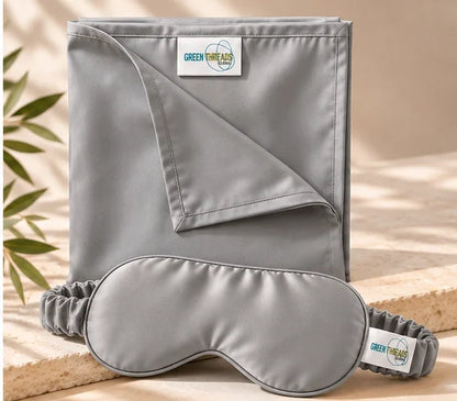 The Sleep Duo in grey: folded bamboo lyocell pillowcase with matching sleep eye mask.
