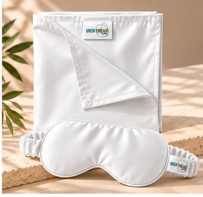 The Sleep Duo in white: folded bamboo lyocell pillowcase with matching sleep eye mask.