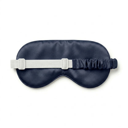 Navy bamboo lyocell sleep eye mask — adjustable strap detail showing elastic and premium finish.