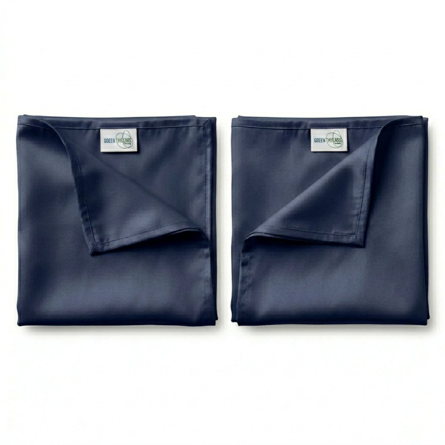 Pair of premium bamboo lyocell pillowcases in Navy designed for cooler sleep and gentle care for hair and skin.