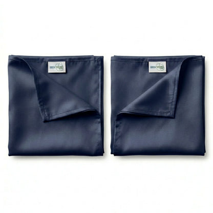Pair of premium bamboo lyocell pillowcases in Navy designed for cooler sleep and gentle care for hair and skin.