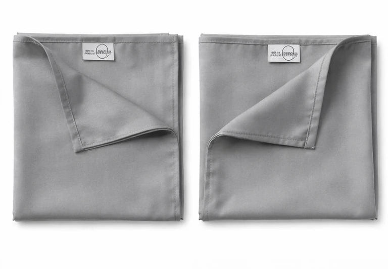 Pair of premium bamboo lyocell pillowcases designed for cooler sleep and gentle care for hair and skin.
