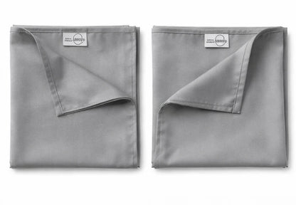 Pair of premium bamboo lyocell pillowcases designed for cooler sleep and gentle care for hair and skin.