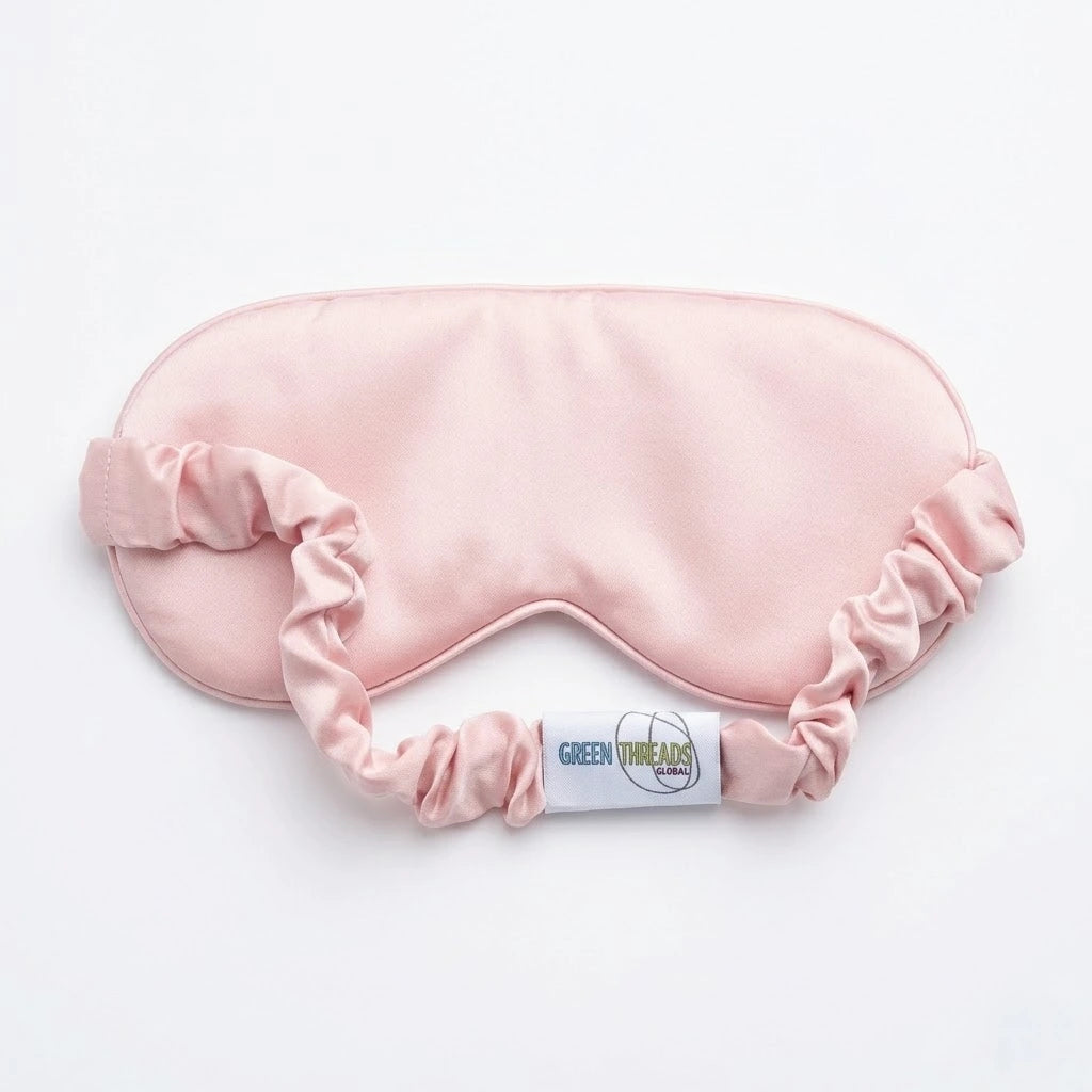 Pink bamboo lyocell sleep eye mask — reverse side showing soft inner lining detail.