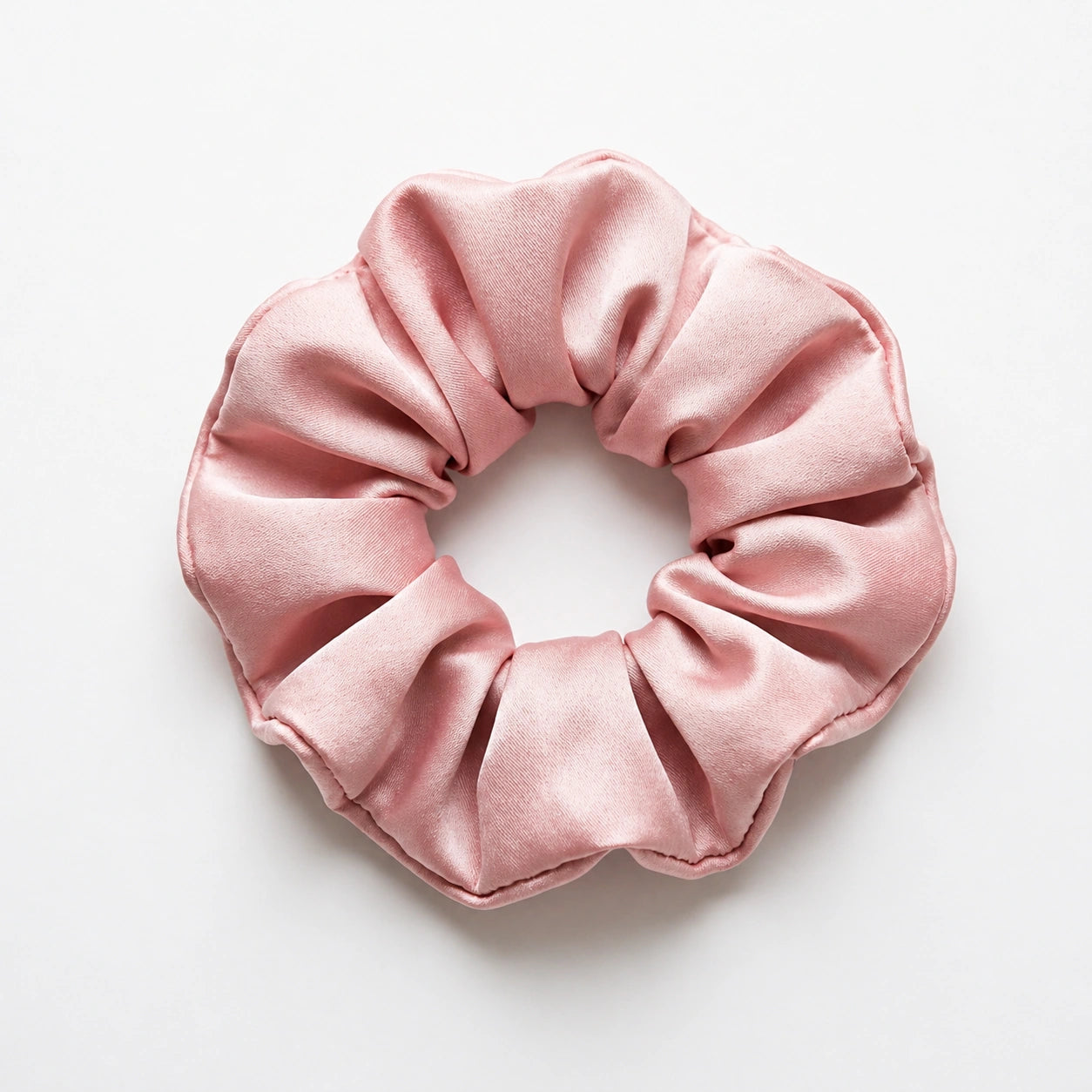 Bamboo lyocell hair scrunchie in Pink designed to help reduce hair breakage and friction.