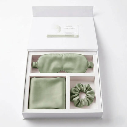Essential Sleep Solution™ bamboo lyocell gift set in Sage featuring two pillowcases, eye mask and scrunchie beautifully presented in a premium gift box.