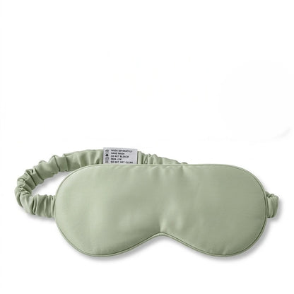 Sage bamboo lyocell sleep eye mask — front view showing contoured design.