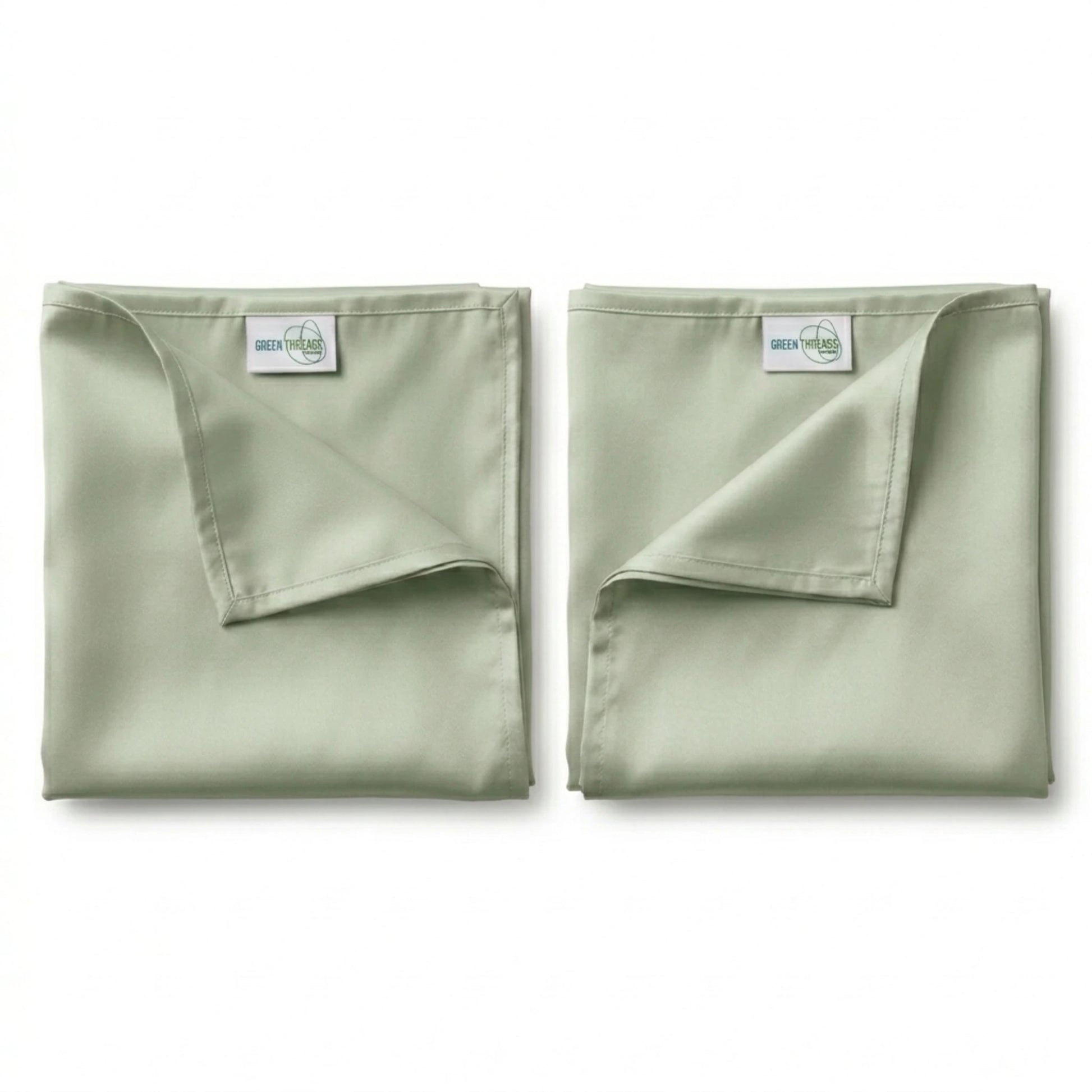 Pair of premium bamboo lyocell pillowcases in Sage designed for cooler sleep and gentle care for hair and skin.