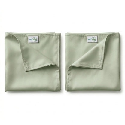 Pair of premium bamboo lyocell pillowcases in Sage designed for cooler sleep and gentle care for hair and skin.