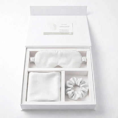 Essential Sleep Solution™ bamboo lyocell gift set in White featuring two pillowcases, eye mask and scrunchie beautifully presented in a premium gift box.