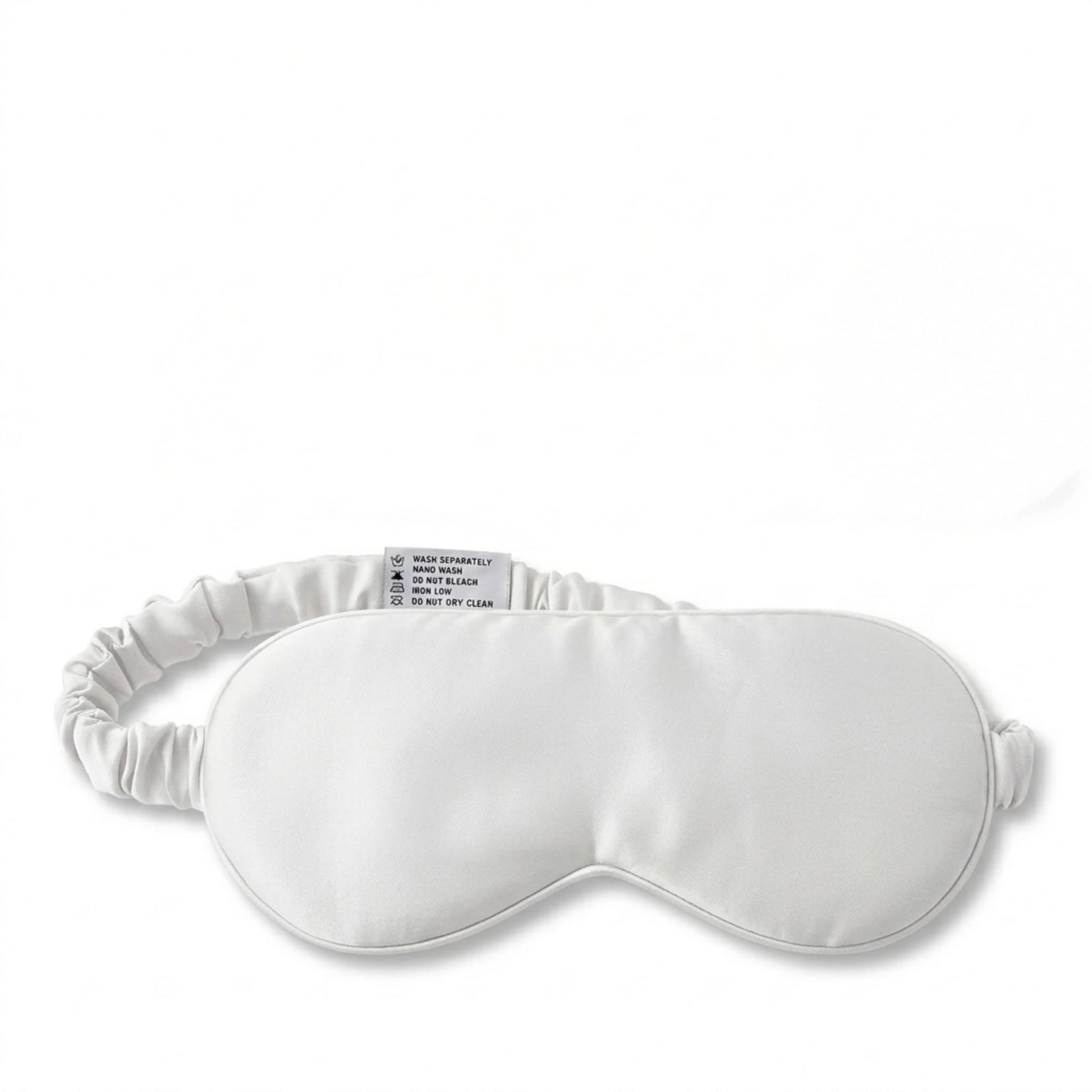 White bamboo lyocell sleep eye mask — front view showing contoured blackout design.