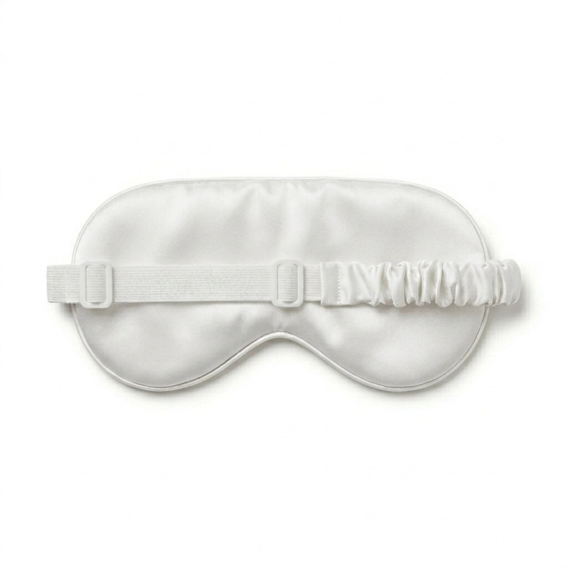 White bamboo lyocell sleep eye mask — adjustable elastic strap detail close-up.
